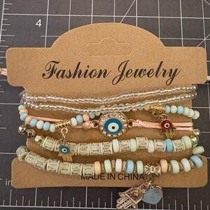 Elegant Gold and Cream Bracelet